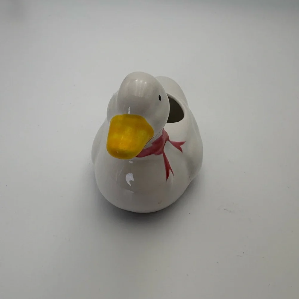 Charming White Duck Planter with Red Bow